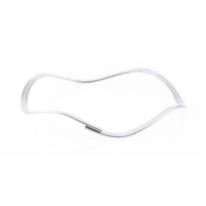 yksikierroksinen limittäinen aaltomainen jousialuslevy